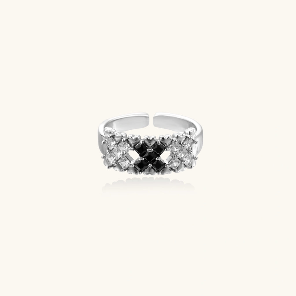White gold plated adjustable ring with three rows of square zirconia stones in black or pink chevron pattern