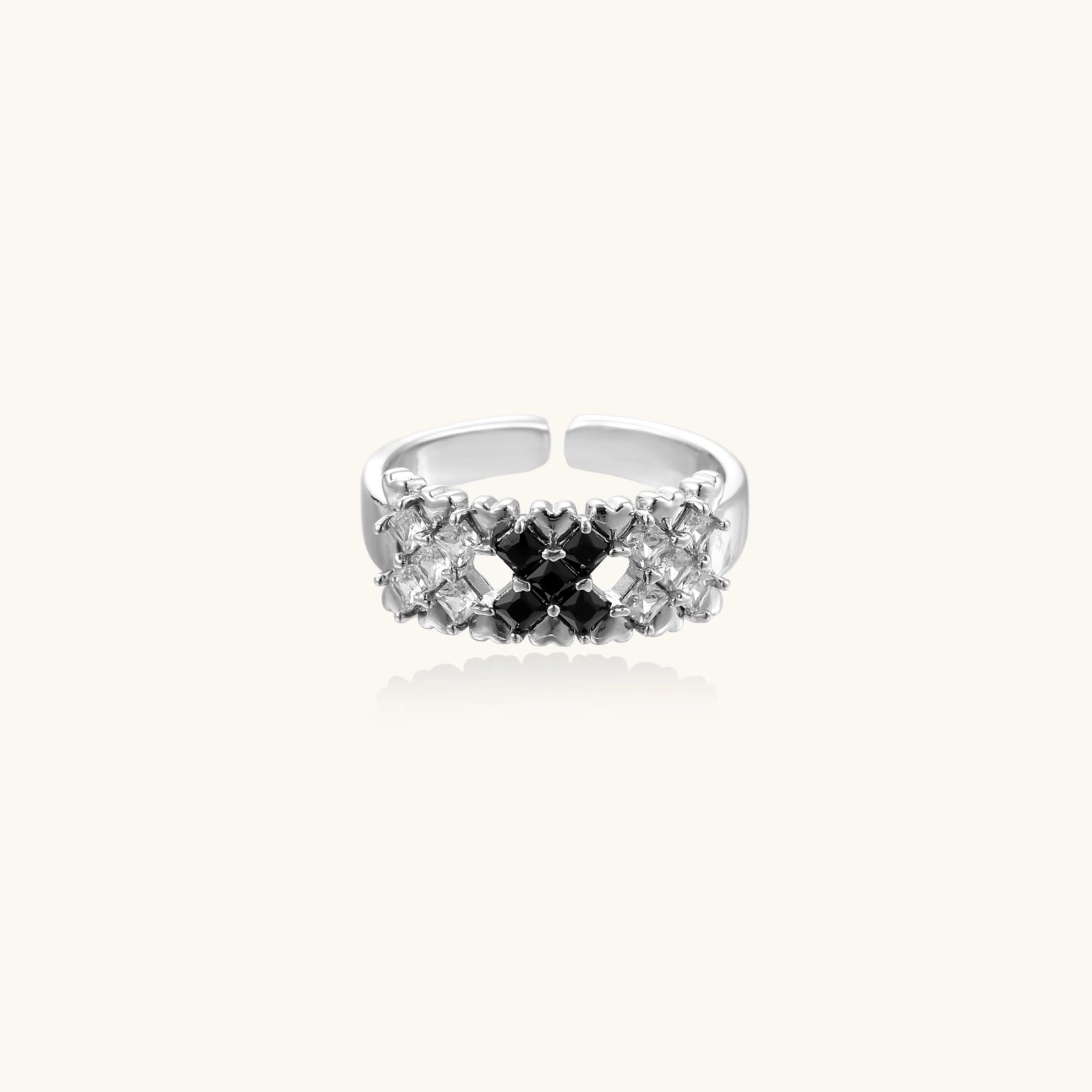 White gold plated adjustable ring with three rows of square zirconia stones in black or pink chevron pattern
