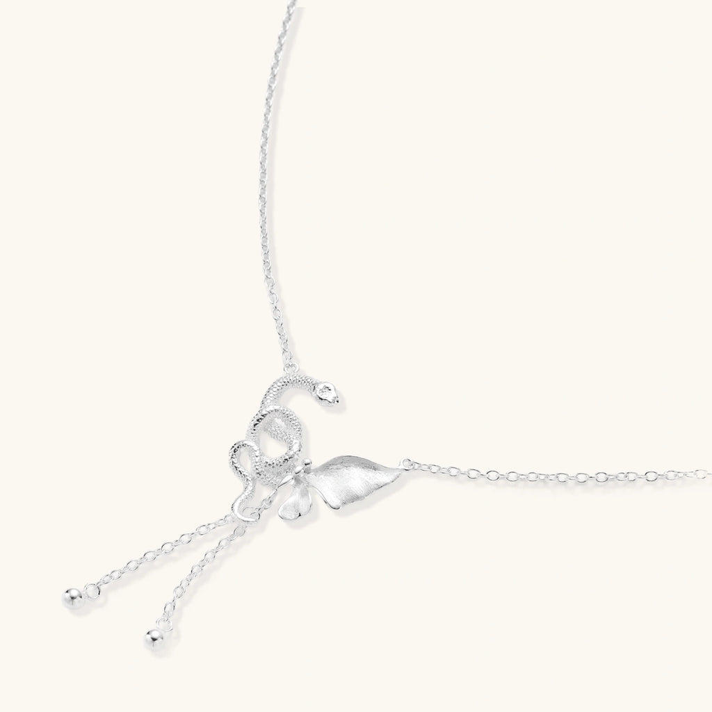 Sterling silver butterfly pendant with textured wing detail on adjustable Y-chain with ball drop ends